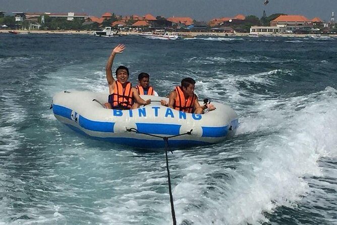 Bali Parasailing Adventure,Banana Boat,Jet Ski and Donut Boat with Transfers - Banana boat and donut boat: maximum laughs, minimal control