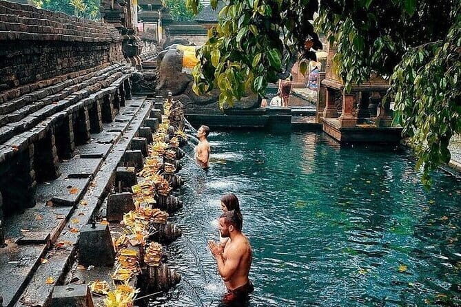 Ubud Hidden Gems Waterfall, Temple and Rice Terraces Private Tour - Tukad Cepung Waterfall: Sunlight Through Cliffs for a Real Wow Moment